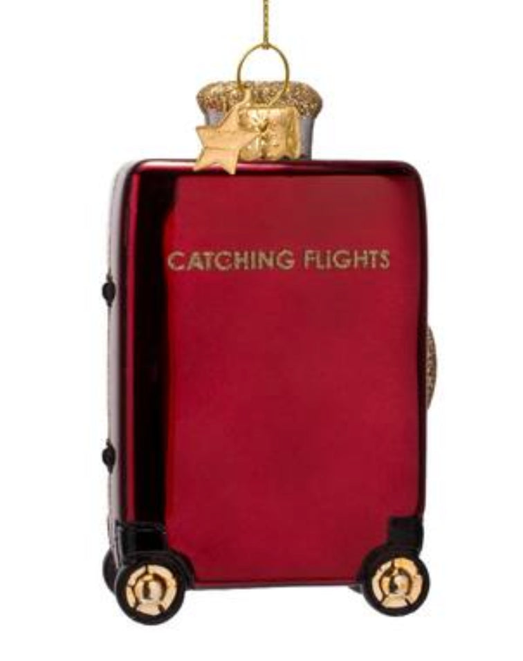 Kerstbal Suitcase catching flights